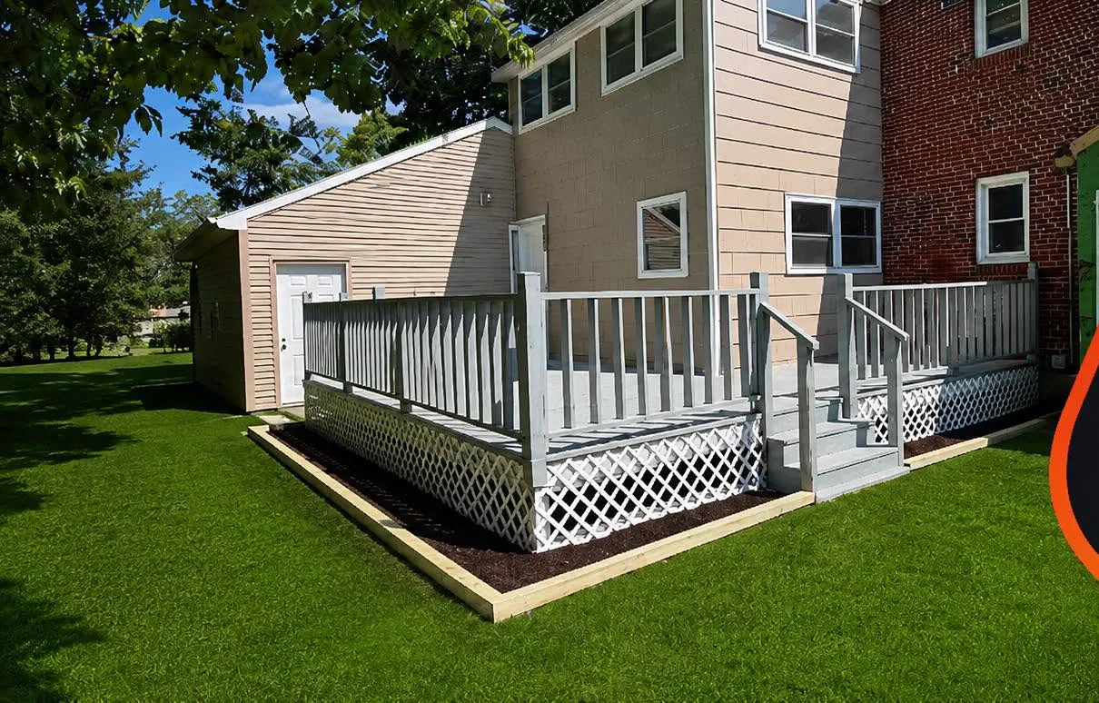 Deck, railings and lattice painted gray behind a Connecticut home